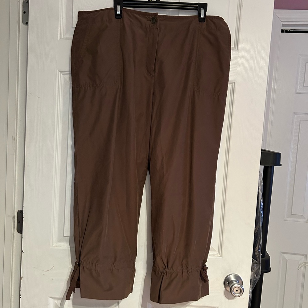 Capri pants with cute tie detail at bottom leg.